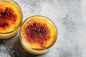 Golden-crusted creme brulee, caramelized toffee delight whispers, French elegance, tantalizing Epiphany celebration, decadent sweet indulgence