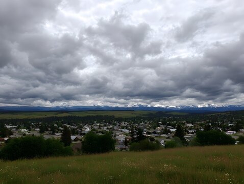 Overcast Sky Dominates Distant Town Landscape
