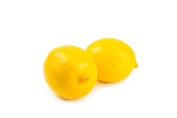 Lemon isolated on white background. Lemon fruits with a slice. Fresh lemon fruits with citrus leaves. Lemon juice. Pattern. Space for text.