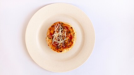 fresh baked pizza bread with condiment and spicy sauce