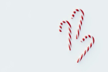 3d render of three candy canes an negative space for copy