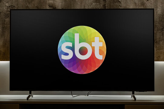 Flat-screen TV set displaying logo of SBT