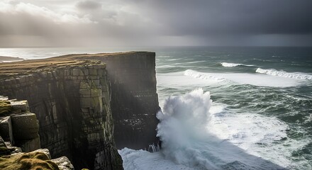 Dramatic sea wave crashing against cliff