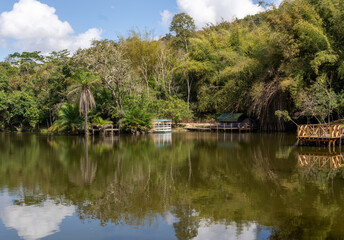 Obraz premium Scenic view of Pugu Hills and its tranquil lake near Dar es Salaam, showcasing Tanzania’s natural beauty and peaceful landscapes.