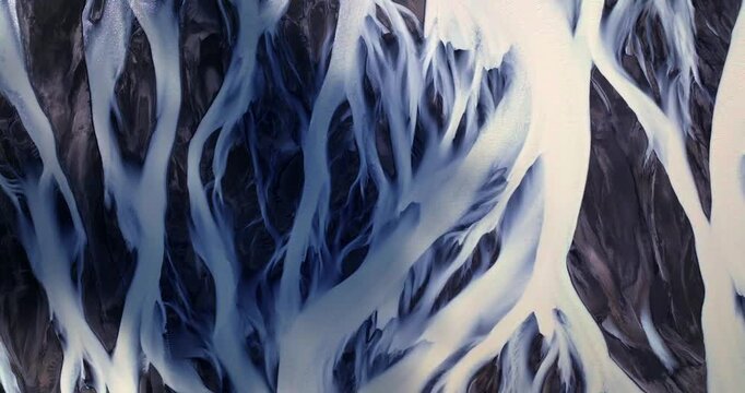 The drone glides over Skei&eth;ar&aacute;rsandur&rsquo;s immense glacial outwash plain, exposing an otherworldly landscape of branching river systems and striking contrasts between bright waters and dark volcanic