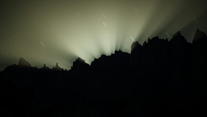 Silhouette of a Mountain Range with a Night Glow