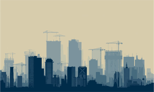 Modern city skyline at dusk with construction cranes creates a dynamic urban cityscape background