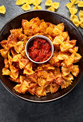 Crunchy fried pasta chips with dips.