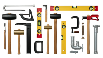 Assortment of construction hand tools arranged against a black backdrop