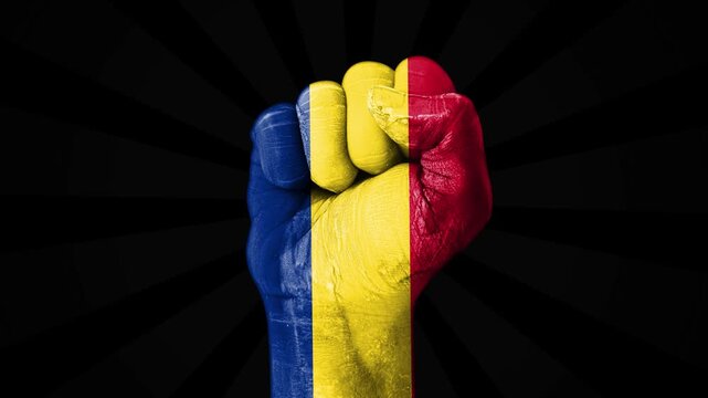 Romania Unification Day concept 4k animation with fist painted in flag colors.