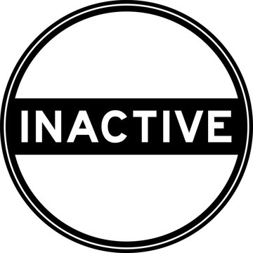 Black color round seal sticker in word inactive on white background