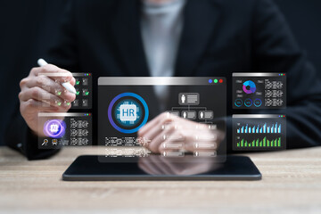 HR Management with AI Technology Concept— Women Executive Using a Tablet to Analyze Employee Data, Evaluate Talent Quality, Predict Role Suitability, and Enhance Strategic Workforce Selection