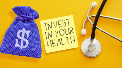 Invest in Your Health - Healthcare Investment Motivation with Dollar Bag and Stethoscope. Financial Wellness and Medical Finance Concept