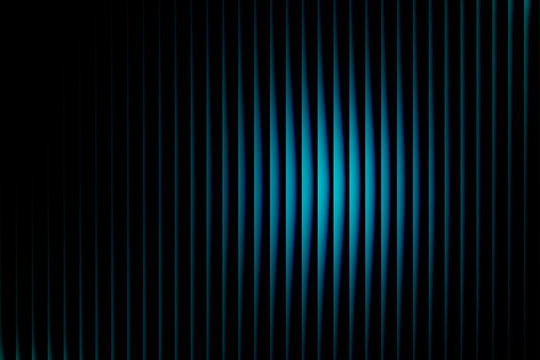 Abstract dark blue and black vertical gradient lines background with glowing central area creating mysterious and digital aesthetic, perfect for futuristic designs or presentations