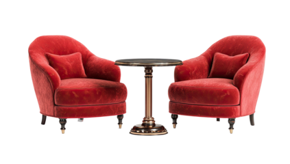 Two plush, red velvet armchairs face each other, with a small round table centered between them