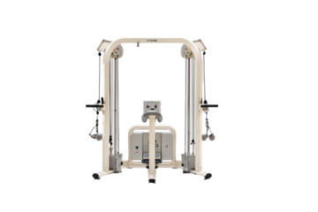 Beige cable machine with weights and adjustable arms for various exercise routines