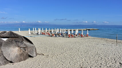 empty beach and sea in village Kallithea on peninsula Kassandra in Greece