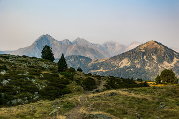 Obraz premium Sunrise panorama of the mountains, including Pic de Néouvielle, between Col de Portet and Refuge du Bastan