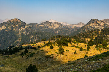 Naklejka premium Sunrise panorama of the mountains, including Pic de Néouvielle, between Col de Portet and Refuge du Bastan