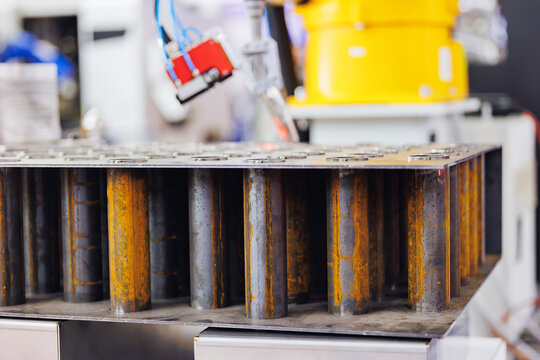 Automated welding process for heat exchange pipe replacement in industrial setting