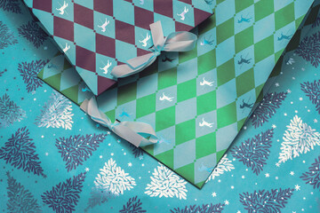 Obraz premium Beautiful holiday packages lying on Christmas backdrop