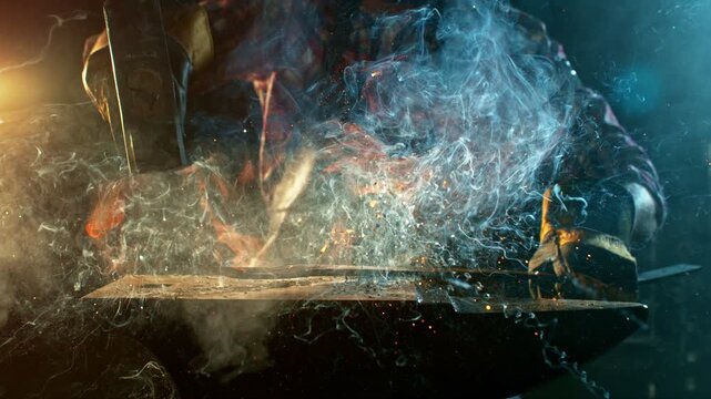 Cinematic close-up of blacksmith forging glowing hot iron on anvil with sparks flying. Shot in dramatic lighting on dark background with high-speed camera at 1000fps. Speed ramp effect.