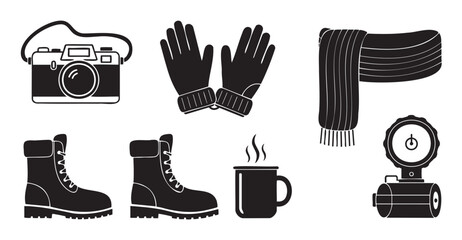 Collection of black and white vector icons for winter travel and outdoor adventure, including a camera, gloves, scarf, boots, a hot drink, and a thermos