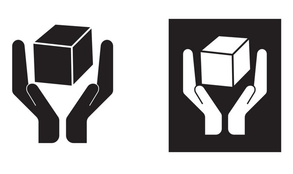 Handle With Care Black icon of two hands gently holding a package, representing &ldquo;handle with care&rdquo; instructions to ensure safe treatment of fragile or sensitive goods during transport.
