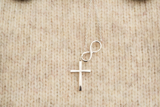 The cross-shaped necklace is a perfectly designed accessory.