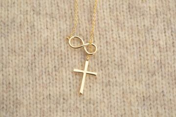 The cross-shaped necklace is a perfectly designed accessory.