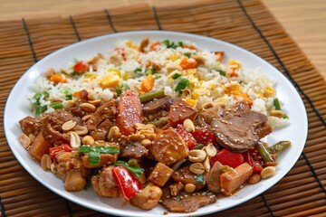 Traditional chicken xadrez with colorful chop suey rice