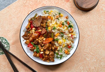 Traditional chicken xadrez with colorful chop suey rice