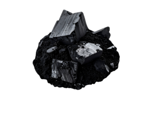 Pile of raw black coal chunks and fine coal dust showing rough mineral texture on isolated background