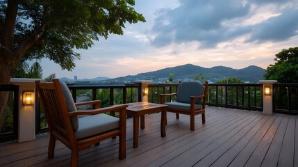 Obraz premium A wooden deck with seating overlooks a town and hills at dusk with dramatic clouds