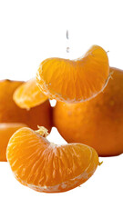 Orange segments and whole oranges are arranged with one segment appearing to float mid-air. studio shot on white