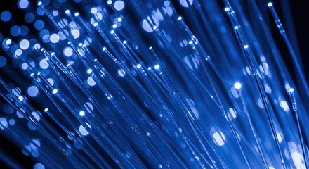 Fiber optic strands glowing blue in sleek digital style  