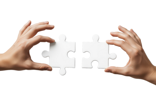 Two Hands Holding Puzzle Pieces Ready to Connect on a White Background