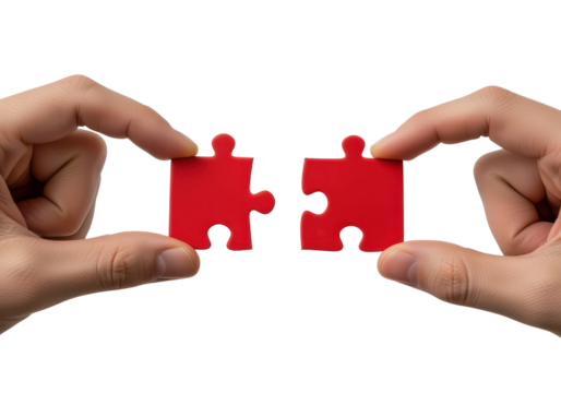 Two Hands Holding Matching Red Puzzle Pieces for Concept of Connection and Solution