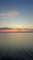 Calm Seascape at Sunset or Sunrise with Soft Colorful Sky