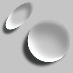 Two translucent glass shapes a circle and an oval with subtle shadows on a gray background ideal for design elements