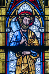 Fototapeta premium Stained glass (19th century) of Saint Matthew the Apostle. Saint of the Roman Catholic Church.