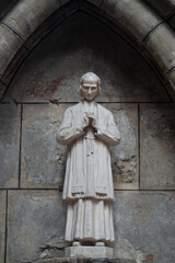 Statue (19th century) of Saint John Mary Vianney the Holy priest of Ars. Saint of the Catholic Church.