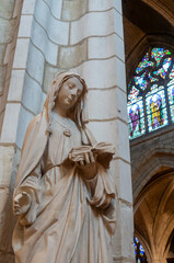 Statue (19th century) of Blessed Virgin Mary reading.