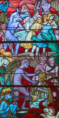 Stained glass (19th century) of Vision of hell and demons tormenting souls.