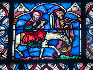 Stained glass (19th century) of Holy Family: The Escape to Egypt.