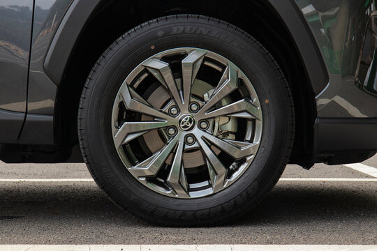 DUNLOP tire and alloy wheel of compact SUV in parking lot - Seoul, South Korea - August 4 2022