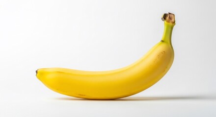 Fresh yellow banana on white background, ready to eat for a healthy snack or smoothie ingredient to boost your energy and well being today
