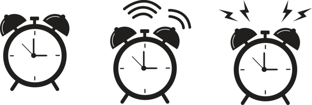 Three alarm clocks in different states of ringing black