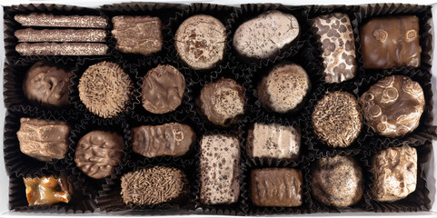 A full box of delicious chocolates. Various chocolate candies