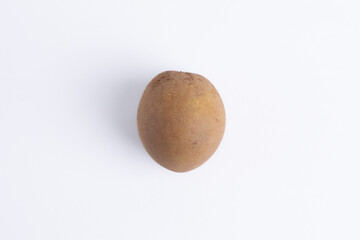 Single fresh sapodilla fruit isolated on white background, chiku, nutritious sweet tropical fruit, delicious healthy snack ingredient.
